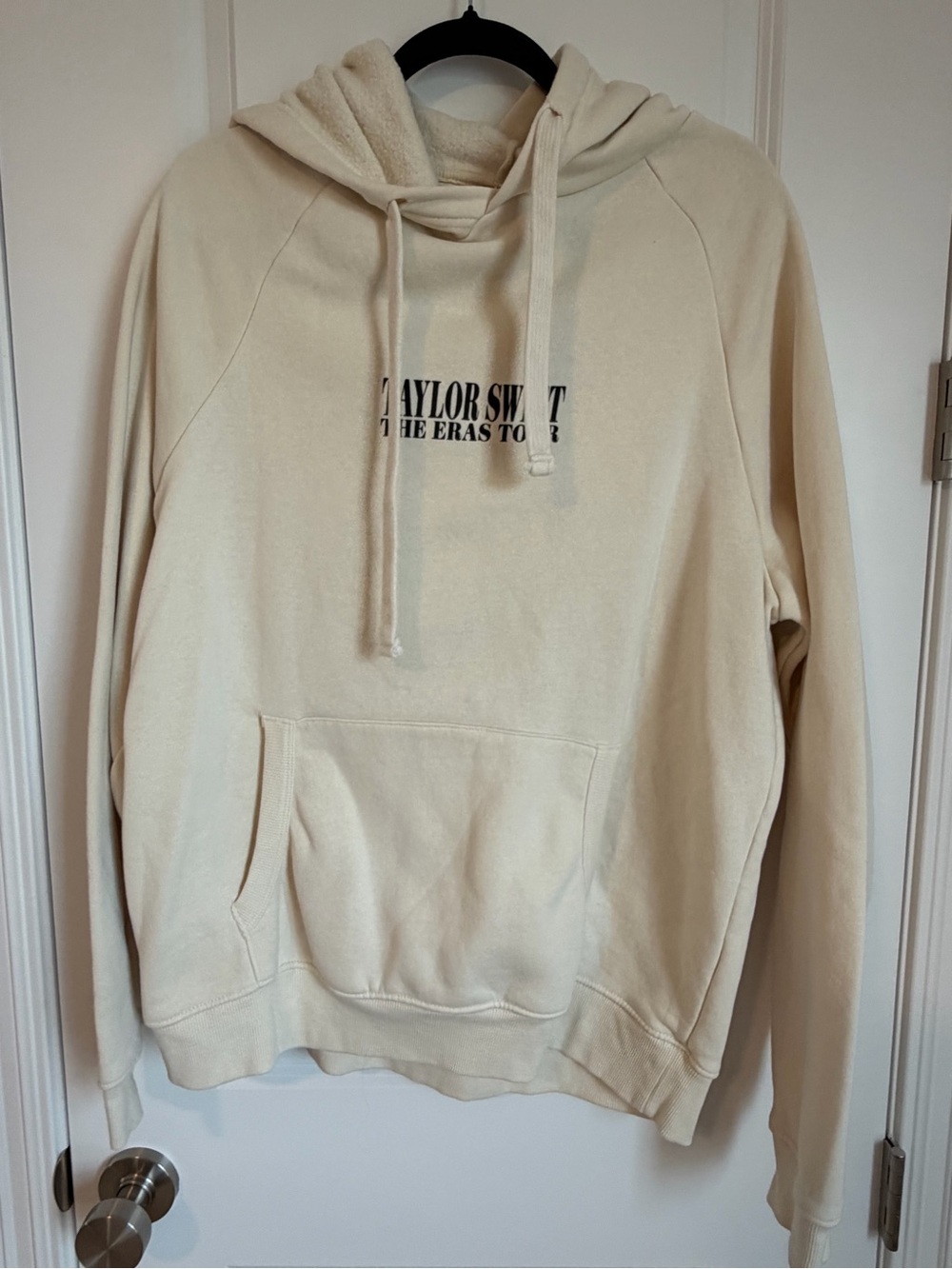 Taylor Swift Cream 'The Eras Tour' Hoodie with Black Logo Tag